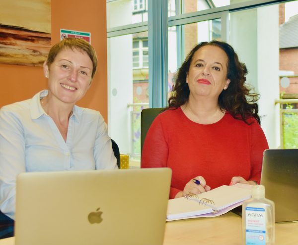 two women smiling